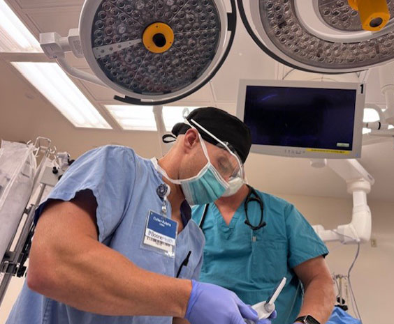 Nurse working with doctor in operating room